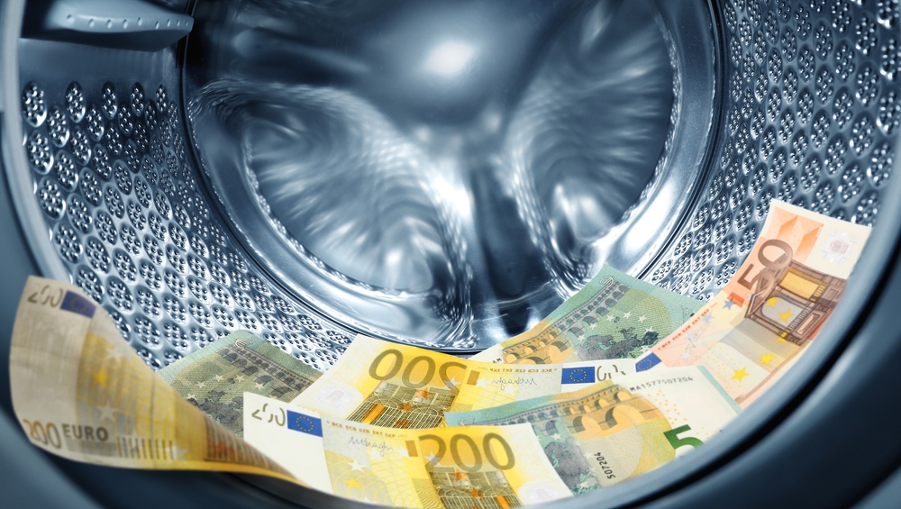 money laundering with bank notes placed inside a washing machine